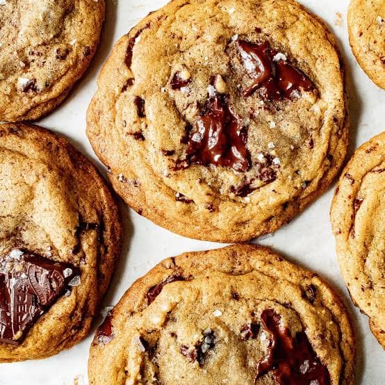 A fresh batch of brown butter chocolate chip cookies on the counter